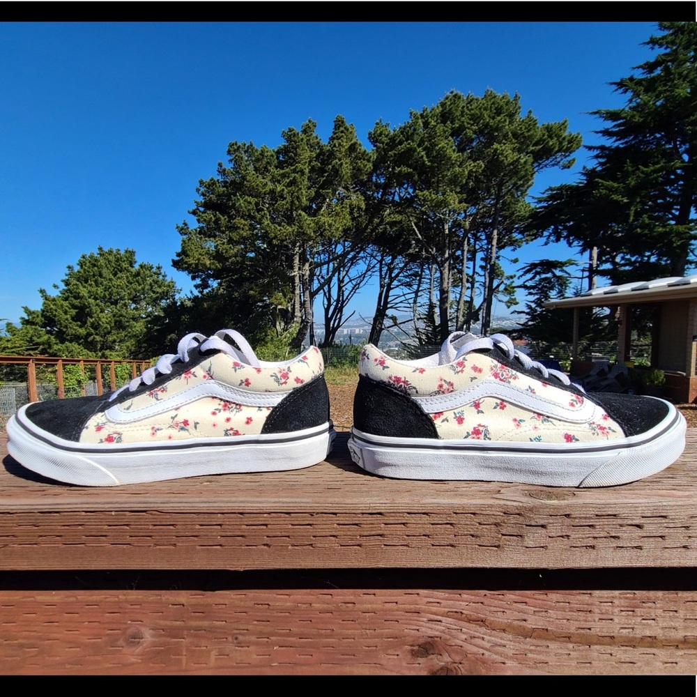 Black and white with flower Vans.